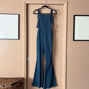 Denim overall tie flare leg jumpsuit